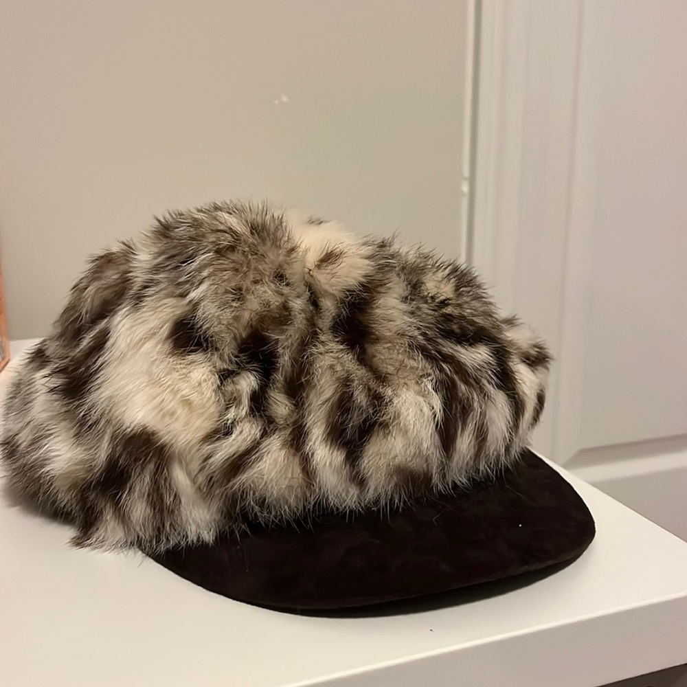 Vintage. Lightly worn. Fur, and then silk inside.